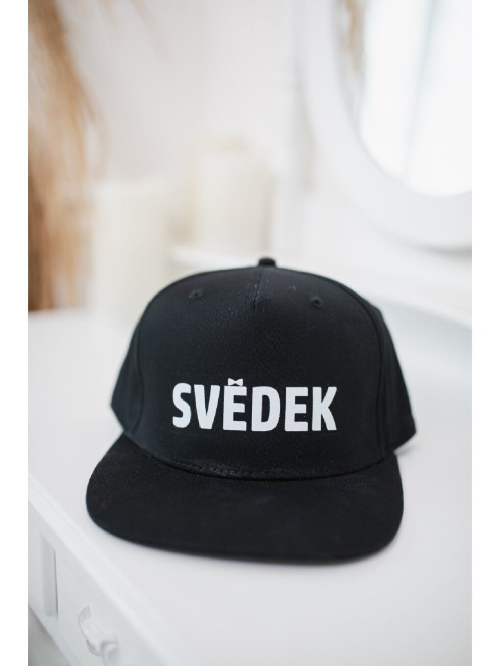 Snapback s potiskem Svědek