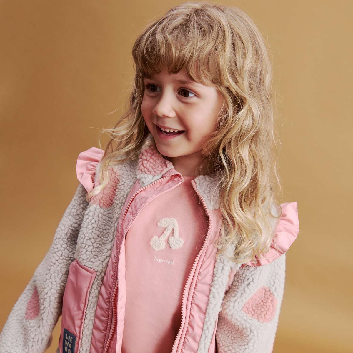 LIEWOOD Noam Dětská fleecová mikina s volánky Spot Dot Sandy/Rose Blush mix