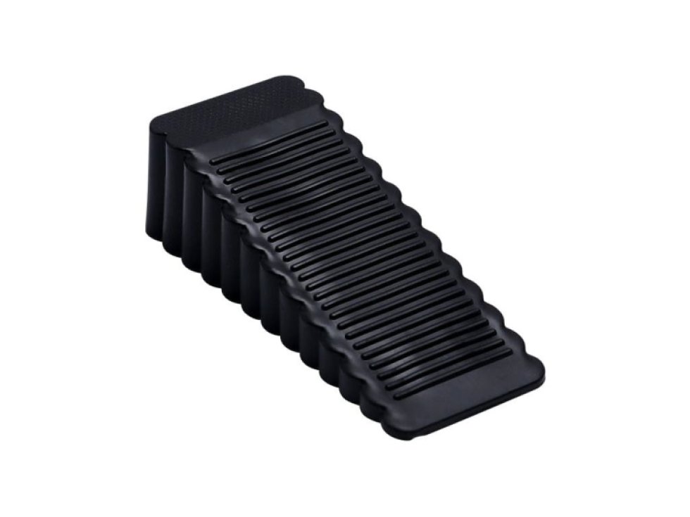 Černá plastová zarážka dveří, klínový tvar, rozměry 4,1 x 9,5 x 2,8 cm