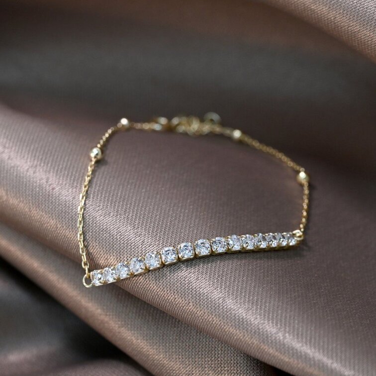 Pozlacený náramek se zirkony 13102.1