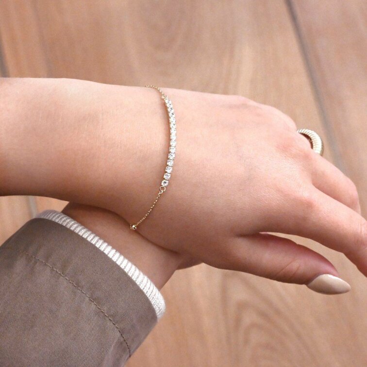 Pozlacený náramek se zirkony 13102.1