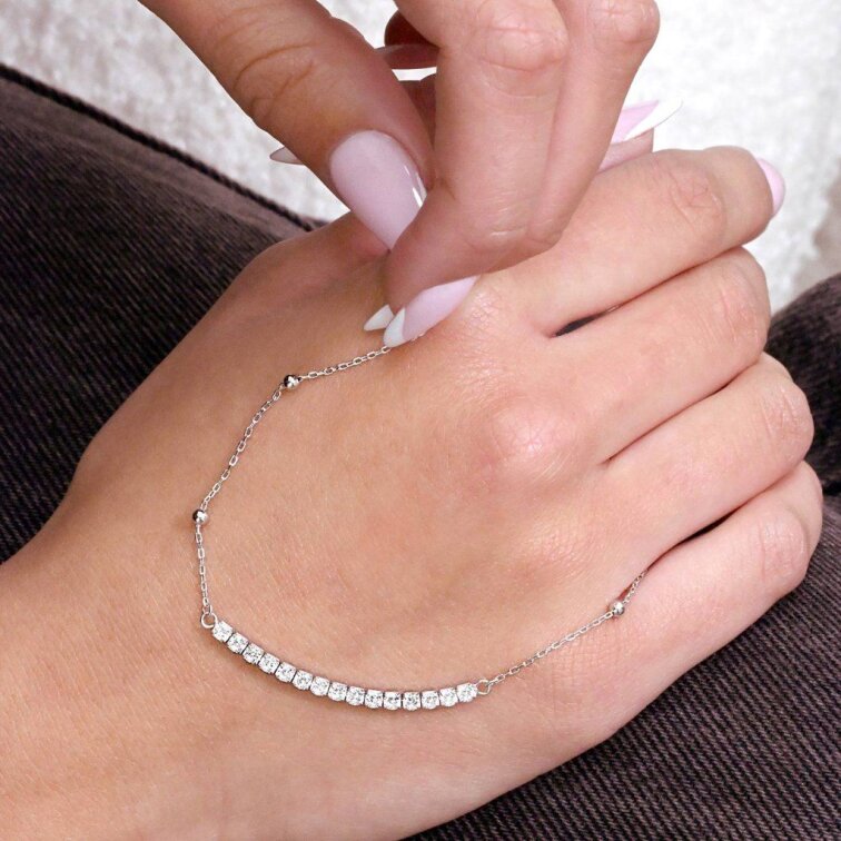 Stříbrný náramek se zirkony 13102.1