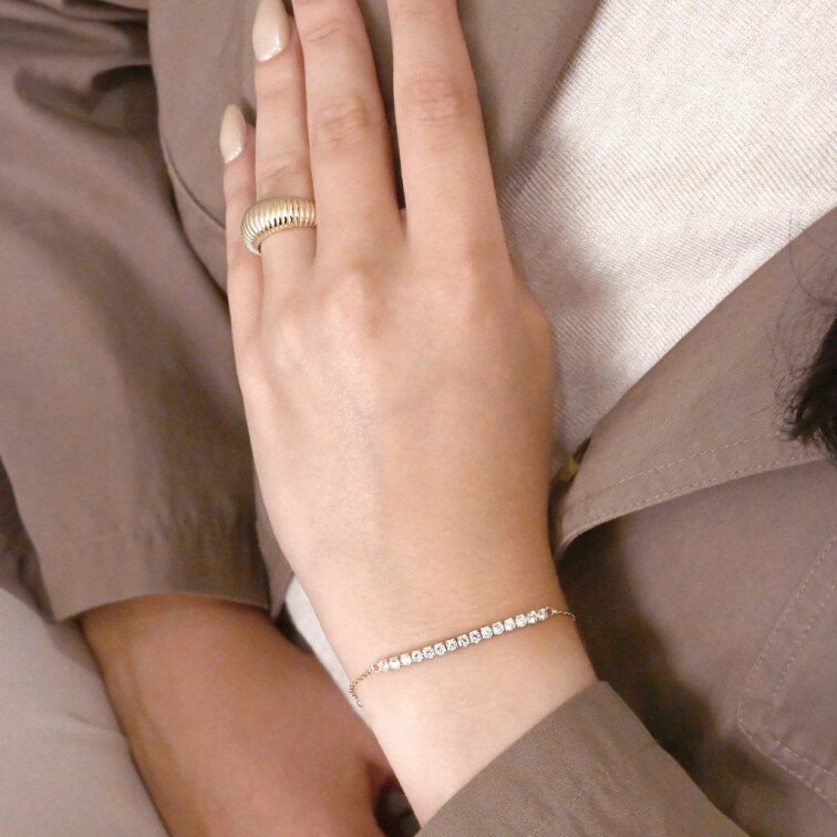 Pozlacený náramek se zirkony 13102.1